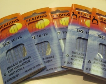 May include: Six packs of Pony Beading needles in size 10/12. The packaging is orange and blue with the text "Beading" and "Size 10/12". The needles are for beading and are made in India.