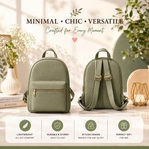 Op de afbeelding: Een saliegroene rugzak getoond van de voor- en achterkant, voorzien van een handvat, verstelbare schouderbanden met goudkleurige hardware en een voorvak met rits. De tekst MINIMAL CHIC VERSATILE Crafted for Every Moment is bovenaan zichtbaar.