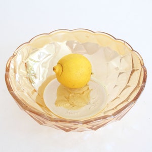 Vintage yellow pink glass bowl with ornament