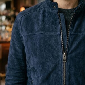 suede leather texture closeup | YKK zipper leather jacket | snap button collar jacket | navy suede detail | premium suede quality | mens leather jacket hardware