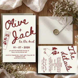 May include: A wedding invitation set featuring cream-coloured paper with dark red handwritten-style text. The main card displays the names Olive + Jack, a photo strip graphic, and the date 11-07-2026. Includes a matching envelope with a wax seal.