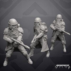 May include: Three grey miniature soldier figurines in uniform, each wearing a helmet, goggles, and armor, carrying long rifles. The figures are posed in a standing position with backpacks and utility gear. The text "PRESUPPORTED" is visible.