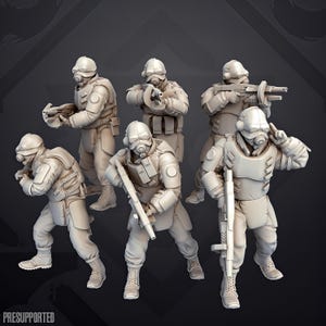 May include: A set of six unpainted beige miniature soldier figurines in tactical gear, each wearing a gas mask and helmet. The figures are posed in various combat stances, holding rifles and heavy weaponry. The text "PRESUPPORTED" is visible.