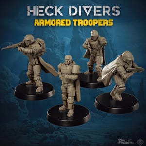 May include: Four tan miniature figurines labelled HECK DIVERS ARMORED TROOPERS. Three figures wear helmets, capes, and armour while holding rifles. One figure is bareheaded in armour. Each stands on a black circular base. Text includes 32mm stl presupported.