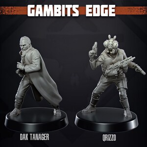 May include: Two grey miniature figures on black circular bases. The left figure, Dak Tanager, wears a long coat and holds a pistol. The right figure, Qrizzo, has an insectoid head and holds two blasters. The text GAMBITS EDGE appears above.