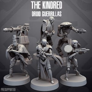 May include: A set of five gray miniature droid figures titled THE KINDRED DROID GUERRILLAS. The figures feature robotic bodies, some wearing capes, and are equipped with various blasters and a heavy mounted cannon. Each stands on a circular base.