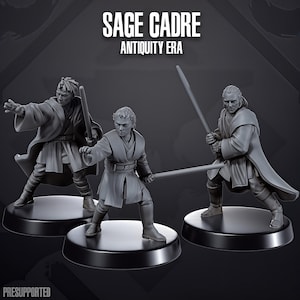 May include: Three grey miniature figures on circular bases, each wearing robes and holding a rod-like weapon. The text SAGE CADRE ANTIQUITY ERA and PRESUPPORTED is visible. The figures are posed in dynamic stances with arms extended or holding weapons.