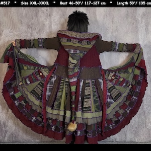 May include: A long, hooded coat featuring a patchwork design in shades of burgundy, olive green, and brown. The garment includes a pointed hood with a pom-pom, ribbed sleeves, and a flared hem. Text: #517 * Size XXL-XXXL * Bust 46-50"/ 117-127 cm * Length 53"/ 135 cm