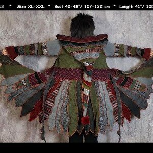 May include: A multi-colored knitted cardigan with a long, flowing design. The cardigan is made from a variety of different fabrics and textures, and features a unique, asymmetrical shape. The cardigan is available in sizes XL-XXL and measures 42-48 inches in bust and 41 inches in length.