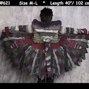 May include: A hooded coat featuring a patchwork design of various knit fabrics in olive green, burgundy, and grey tones. The garment displays a flared, layered hem with scalloped edges, a pointed hood, and text reading #621, Size M-L, Length 102 cm.