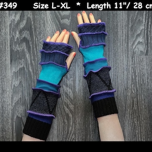 May include: A pair of fingerless gloves in blue, purple, and black with a ruffled design. The gloves are 11 inches long and are size L-XL.