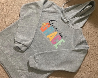 Sudadera con capucha "Crece en la gracia"