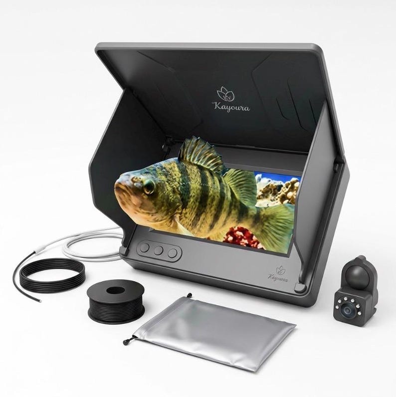 May include: A dark gray portable fish finder monitor with a sun hood displaying a yellow and black striped fish. Includes a black spool of cable, a separate camera unit with LED lights, a silver storage pouch, and a long thin black cable.