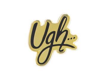 May include: Gold-colored pin with the word "Ugh..." written in black.