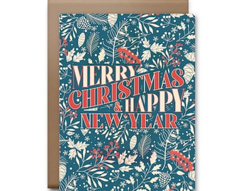 May include: A blue Christmas card with a white floral pattern and the text "Merry Christmas & Happy New Year" in red and white.