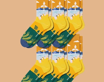 Paquete de 6 pares de calcetines de colección con diseños artísticos: Energía limpia y acción climática.