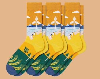 Paquete de 3 pares de calcetines de colección con diseños artísticos: Energía limpia y acción climática.