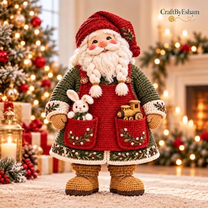 May include: A crocheted Santa Claus doll wearing a red hat, a dark green long-sleeved coat, and a red apron with two pockets. One pocket holds a small white crocheted rabbit, and the other holds a small yellow toy train. The doll has a white beard.