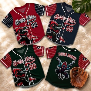May include: Four short-sleeve button-down baseball jerseys featuring Spider-Verse graphics. Three jerseys display the text Spider-Verse and the number 00 in red, navy, or green. One green jersey features the text Your Name and a leaping character.