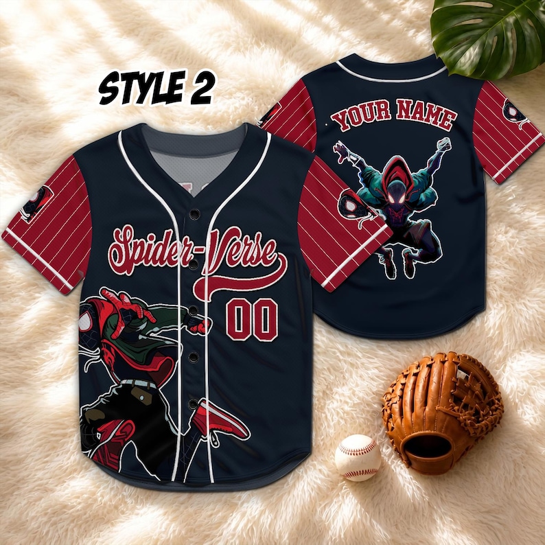 May include: A navy blue and red pinstriped baseball jersey featuring the text Spider-Verse and the number 00 on the front, with a graphic of a character in a hooded suit. The back displays the text YOUR NAME and a character graphic.