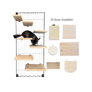 May include: A black wire grid wall featuring multiple light-colored wooden platforms of various shapes and sizes, with a chinchilla resting on one shelf. The text 10 Sizes Available! is displayed next to several additional wooden platforms.
