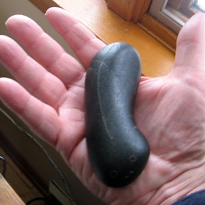 Basalt palm stone with etching