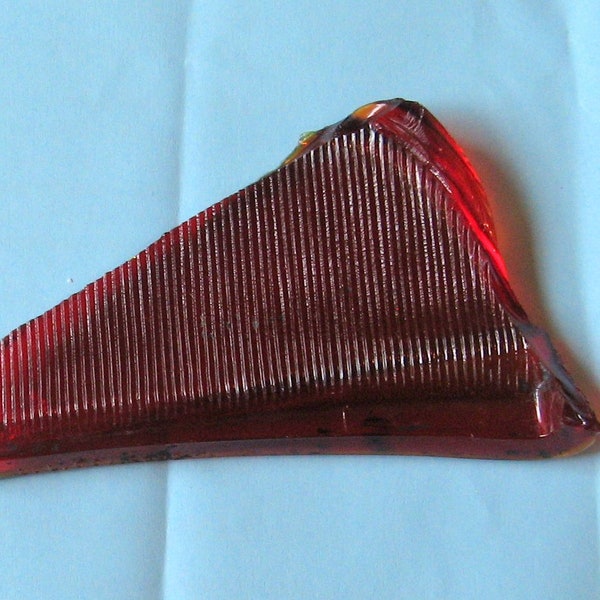 Vintage red glass taillight shard