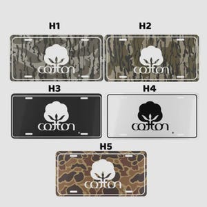 May include: License plates with a cotton logo in various designs. The plates feature camouflage patterns in shades of green and brown, a black plate, a white plate, and a brown and tan pattern. The cotton logo is white or black.