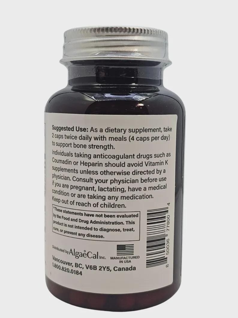 May include: A brown supplement bottle with a silver lid. The label includes text about usage and warnings. The bottle is filled with capsules and is manufactured in the USA.