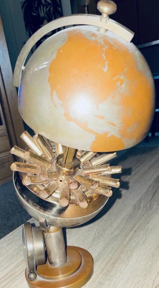 vintage brass globe cigarette holder holders 1950s Cigarette $175 #1950scalled #madmenstyle #1950stobacciana #worldglobeart #midcenturymodern Large French Brass Cigarette Dispenser