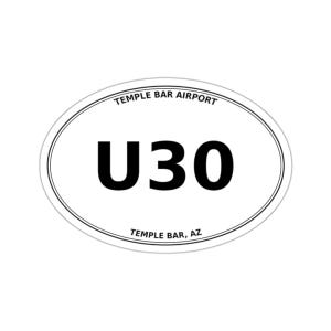 May include: An oval-shaped white sticker featuring a thin black border. The text TEMPLE BAR AIRPORT is printed in black along the top curve, while TEMPLE BAR, AZ is printed along the bottom curve. The large black alphanumeric code U30 is centered.