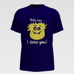 May include: A navy blue t-shirt with a yellow cartoon monster design and the text "Bite me... I dare you!" The monster has a spiky head and a smiling face. The shirt is a short-sleeved crew neck.