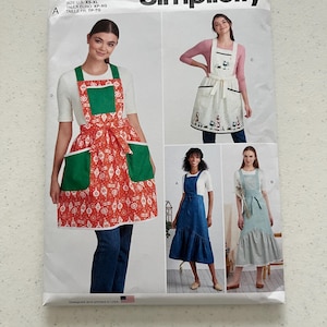 May include: A sewing pattern for making aprons. The pattern includes four different styles: a green and red Christmas-themed apron, a white apron with a floral design, a denim apron, and a blue and white floral apron. The pattern is for sizes XS-XL.