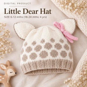 May include: A cream-colored knit hat featuring a brown spotted pattern, two pointed ears, and a pink bow. The text reads: DIGITAL PRODUCT Little Dear Hat SIZE 6-12 mths (18-24 mths; 4 yrs). The hat has a ribbed brim and a soft, textured appearance.