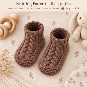 May include: A pair of brown knitted baby booties featuring a central cable knit pattern and a ribbed cuff. The text at the top reads Knitting Pattern – Toasty Toes, Size 1-3 (6-9: 12-18: 2-3-4) months/years, English PDF.