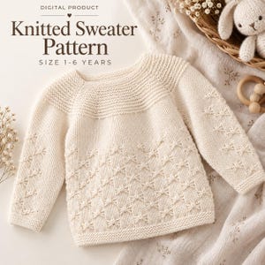 May include: A cream-coloured long-sleeve knitted jumper with a textured yoke and a repeating bow-like stitch pattern on the body and sleeves. The text reads: DIGITAL PRODUCT Knitted Sweater Pattern SIZE 1-6 YEARS.