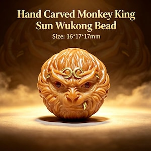 May include: A hand-carved Monkey King Sun Wukong bead measuring 16 by 17 by 17 mm. The bead is light brown with a detailed monkey face, featuring gold-colored accents on the forehead and a single gold-colored tooth, plus dark red eyes.
