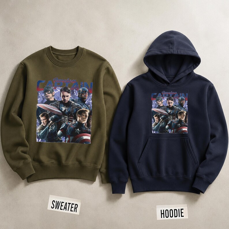 May include: An olive green crewneck sweater and a navy blue hoodie. Both feature a graphic of Captain America and the text "Captain America". The sweater and hoodie are displayed on a neutral background.