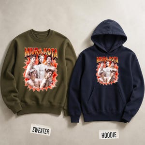 May include: An olive green crewneck sweater and a navy blue hoodie. Both garments feature a graphic of a group of people with the text "MIURA KOTA" in an orange, retro font. The sweater and hoodie are displayed on a neutral background.