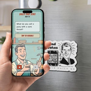 May include: A smartphone displaying a Daily Dad Joke interface with a cartoon character holding a hammer, alongside a white magnet featuring a black and white illustration of a man holding a phone with a QR code and the text Dad Jokes scan me.