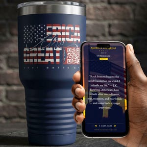 May include: A navy blue stainless steel tumbler with a silver lid, featuring a graphic of the American flag and the text "ERICA the GREAT" along with a QR code. Next to it, a smartphone displays a screen titled "AMERICA THE GREAT" with text.