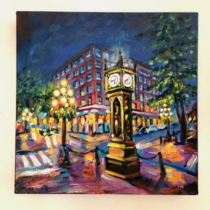 May include: An oil painting depicts a nighttime city scene with a prominent clock tower. The artwork features a vibrant color palette of blues, yellows, and purples, with streetlights illuminating the wet pavement. Buildings and trees are also visible.