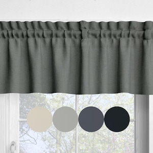 May include: A gray valance curtain with a gathered top, hanging above a window. Below the curtain are four color swatches: cream, light gray, medium gray, and dark gray. The curtain is made of a textured fabric.