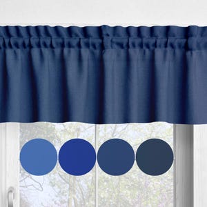 May include: A navy blue valance with a gathered top, hanging above a window. Below, four circles display shades of blue, from light to dark. The valance is made of a solid, opaque fabric.