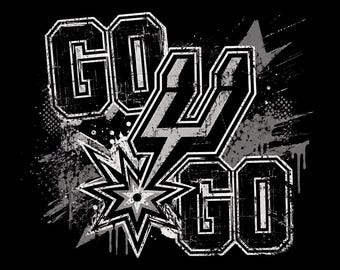 May include: Black graphic design with the words "GO 4 GO" in a distressed, collegiate-style font. A lightning bolt and starburst graphic are incorporated into the design, with gray and white accents. The background is black.