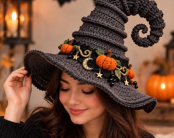 May include: A dark gray crocheted witch hat featuring a tall, curled point. The base is adorned with a black lace band, small orange crocheted pumpkins, green leaves, gold-toned moon and star charms, and small black beads along the brim.