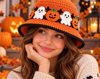 May include: A bright orange crochet bucket hat featuring a black band decorated with alternating white ghost and orange jack-o'-lantern motifs. The hat has a solid orange crown and a black trim along the edge of the brim, crafted with yarn.