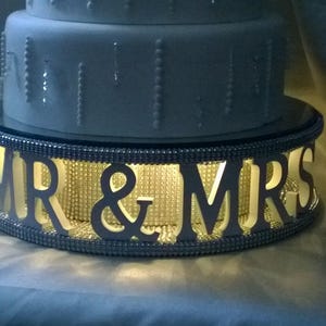 Mr & Mrs + personalised with wedding date- REAL CRYSTAL stones covered wedding cake stand + lights by Crystal wedding uk