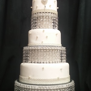 Real crystal tiered stacked crystal cake stands and separators with led by Crystal wedding uk