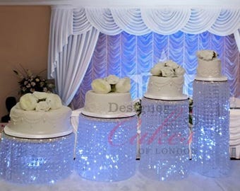 Wedding cake stand [ Crystal cake stand, 4 tiers crystal wedding cake holder cascading display stand plus LED lights by Crystal wedding uk